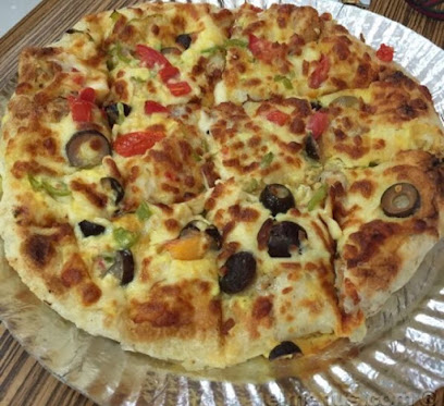 مطعم بيتزا العالم - بريدة - +966 16 383 9955