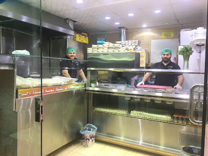 فلافل التفاحه ومشويات (ابو وديع) ومعلمين سوريين - الهدا - +966 50 271 6870