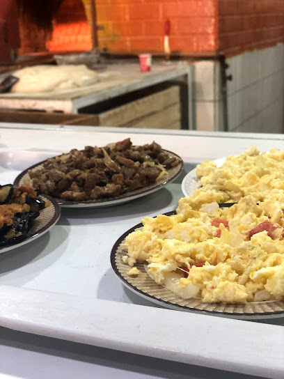 مطعم لمعة الشرق - Buraydah 52361