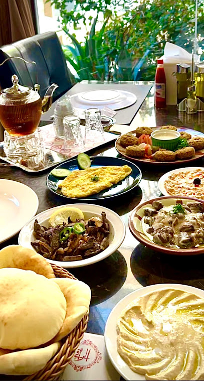 مطعم الراقي - Saudi Arabia|Hail 55461|Salah Al-Din Al-Garbi|4186 7199 King Faisal Rd