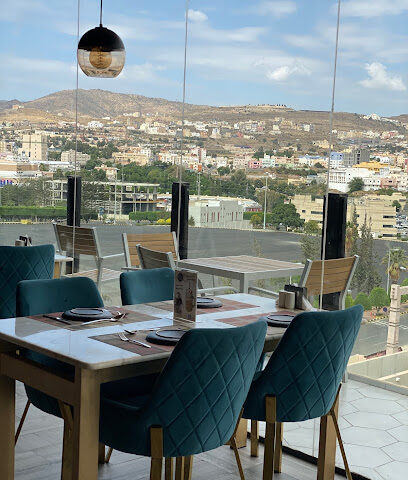 مطعم وكافيه ذا روف - أبها - +966 50 973 0001
