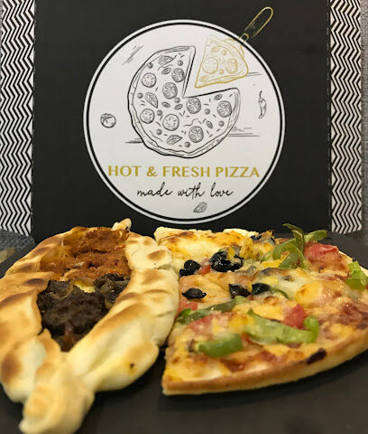 خياط الزي السعودي / محل بيتزا - بريدة - +966 53 285 5210